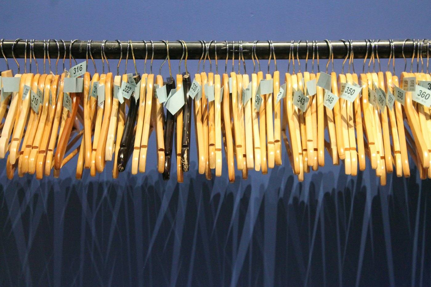 Hangers with numbered tags on a rail
